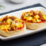 Mini English Muffin Pizzas Using MJ’s Italian Pizza Sauce